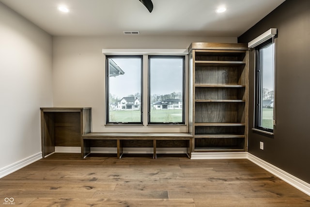 interior space with baseboards, recessed lighting, and a wealth of natural light