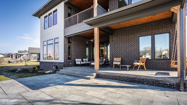 view of patio with a balcony