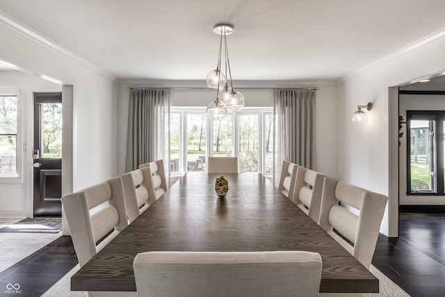 1995 W 116th St, Carmel, IN 46032 - dining area featuring baseboards, ornamental molding, and dark wood-type flooring