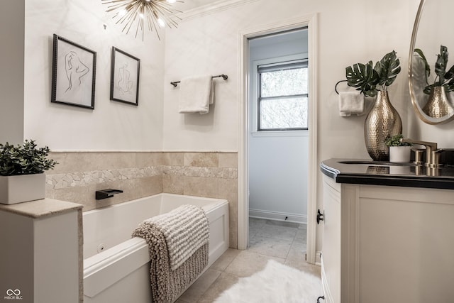 1995 W 116th St, Carmel, IN 46032 - bathroom featuring vanity, tile patterned floors, a bath, and a chandelier