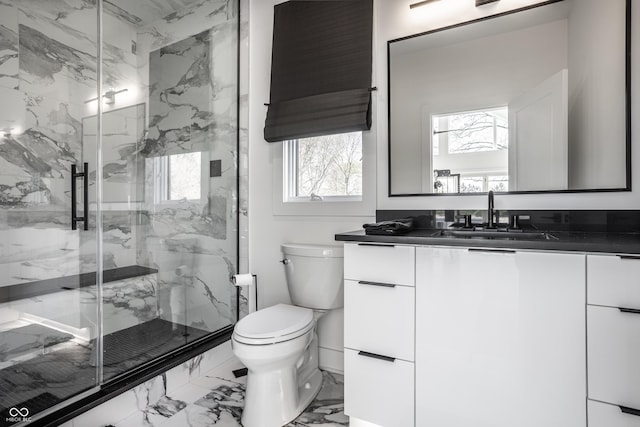 1995 W 116th St, Carmel, IN 46032 - full bathroom featuring vanity, baseboards, toilet, marble finish floor, and a marble finish shower