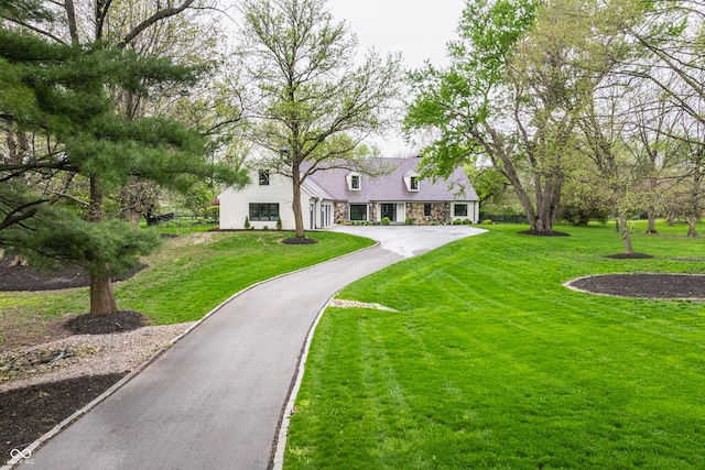 1995 W 116th St, Carmel, IN 46032 - surrounding community with a lawn and aphalt driveway