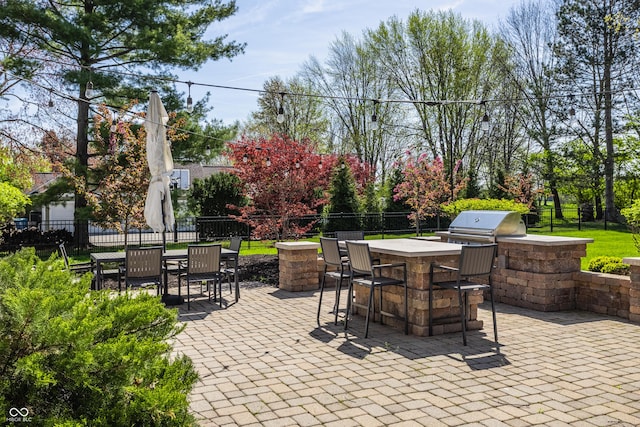 1995 W 116th St, Carmel, IN 46032 - view of patio featuring an outdoor kitchen, fence, outdoor dry bar, and a grill