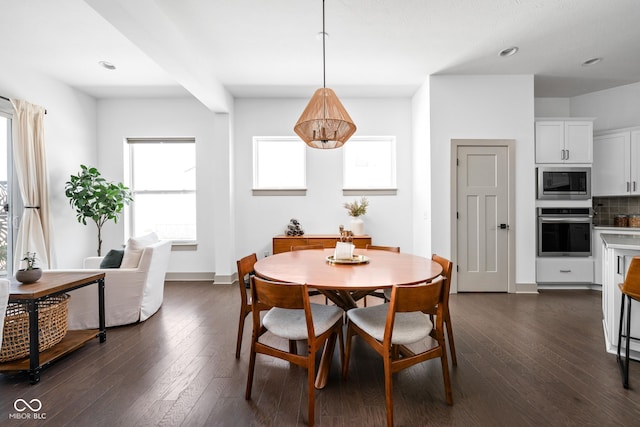 dining space featuring baseboards, recessed lighting, and dark wood finished floors