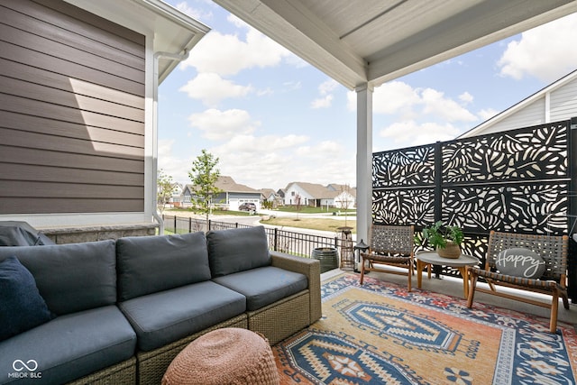 view of patio featuring a residential view and outdoor lounge area