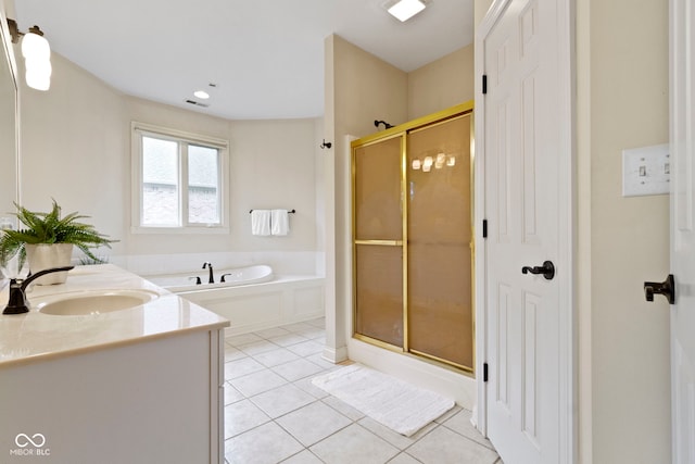 bathroom featuring a garden tub, visible vents, a stall shower, vanity, and tile patterned floors