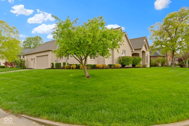 view of front of house featuring an attached garage, a front lawn, and stone siding