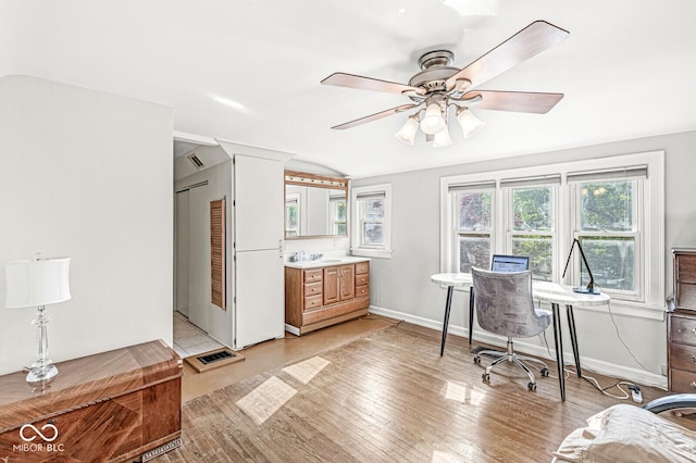 5747 Allisonville Rd, Indianapolis, IN 46220 - office space featuring visible vents, light wood-type flooring, ceiling fan, and vaulted ceiling