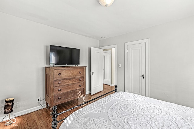 5747 Allisonville Rd, Indianapolis, IN 46220 - bedroom with wood finished floors and baseboards