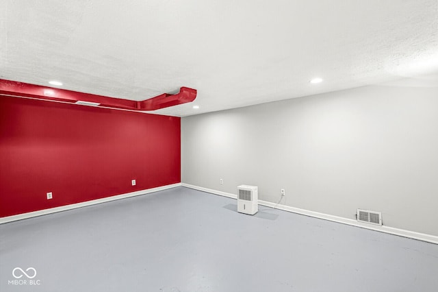 5747 Allisonville Rd, Indianapolis, IN 46220 - unfurnished room with concrete floors, recessed lighting, visible vents, and baseboards