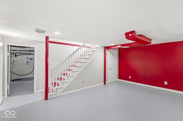 5747 Allisonville Rd, Indianapolis, IN 46220 - finished basement with recessed lighting, stairs, baseboards, visible vents, and a textured ceiling
