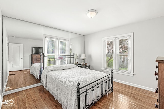 5747 Allisonville Rd, Indianapolis, IN 46220 - bedroom featuring wood finished floors and baseboards