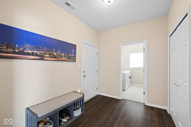 7067 Hart St, Cumberland, IN 46229 - mudroom featuring wood finished floors, washer / dryer, and baseboards