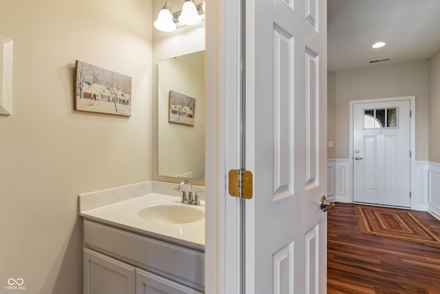 52 E 286th St, Atlanta, IN 46031 - bathroom with wood finished floors, wainscoting, vanity, visible vents, and recessed lighting