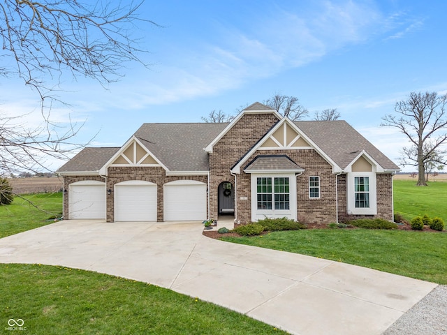 52 E 286th St, Atlanta, IN 46031 - craftsman-style home featuring roof with shingles, concrete driveway, brick siding, an attached garage, and a front yard