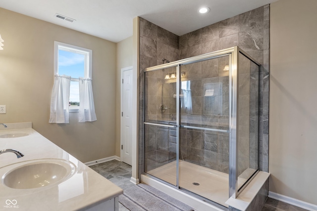 52 E 286th St, Atlanta, IN 46031 - bathroom featuring baseboards, visible vents, a sink, and a shower stall