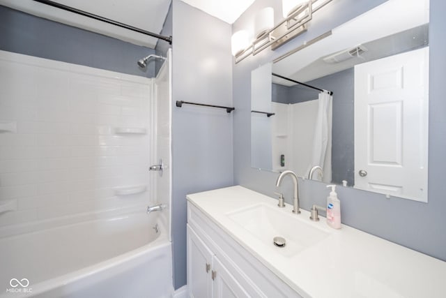 full bath featuring visible vents, shower / tub combo with curtain, and vanity