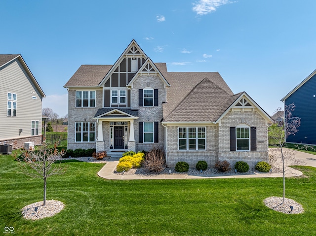 3997 Spylaw Rd, Bargersville, IN 46106 - craftsman-style home featuring a front lawn, central AC, a shingled roof, and brick siding