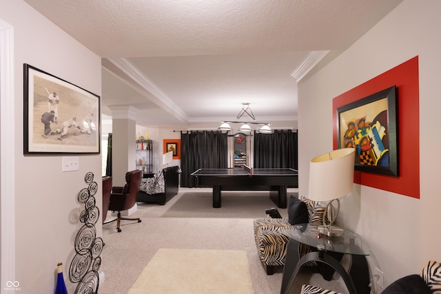 playroom with ornamental molding and carpet floors