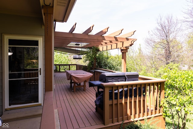 wooden deck featuring a pergola