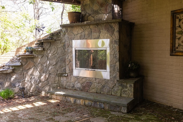 view of side of property featuring stone siding