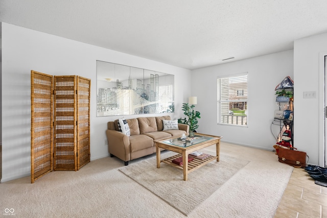 853 Westpointe Dr, Shelbyville, IN 46176 - living room with carpet floors, a textured ceiling, visible vents, and baseboards