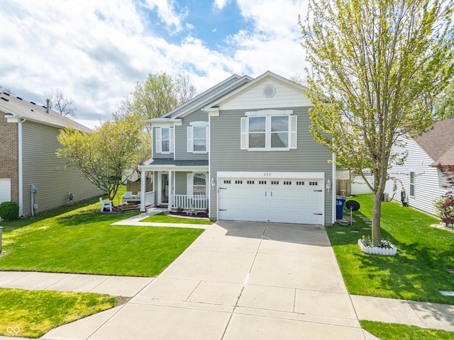 853 Westpointe Dr, Shelbyville, IN 46176 - view of front of house with a garage, a front yard, concrete driveway, and covered porch