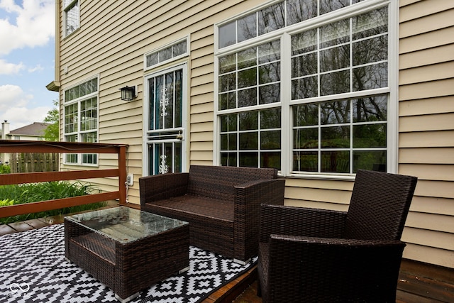 wooden deck featuring an outdoor living space