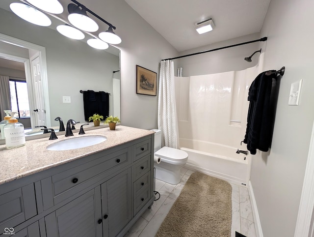 bathroom featuring vanity, toilet, and shower / tub combo