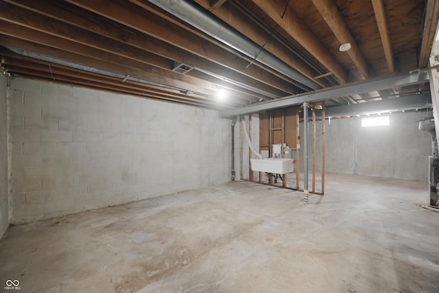 below grade area featuring a sink and visible vents