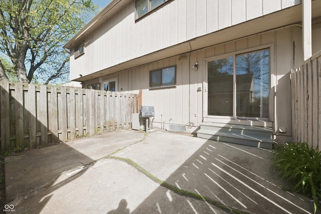 view of patio featuring fence and entry steps