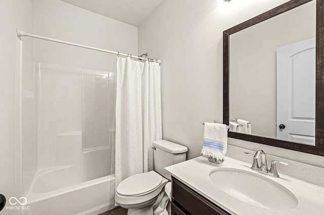 bathroom featuring vanity, toilet, and shower / tub combo