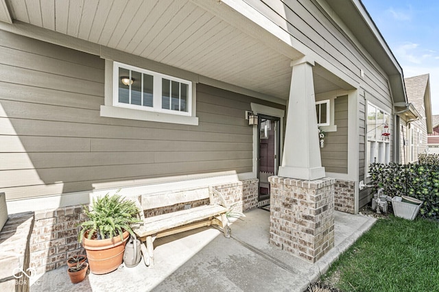 doorway to property with a porch