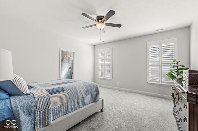 bedroom with baseboards, a ceiling fan, carpet flooring, and visible vents