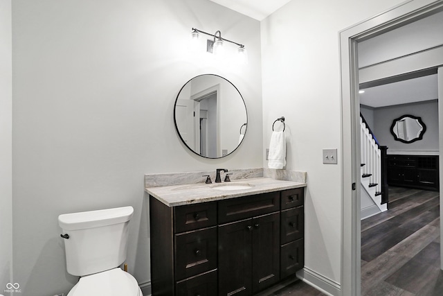 10725 Holliday Farms Blvd, Zionsville, IN 46077 - bathroom with wood finished floors, vanity, and toilet