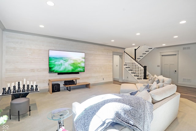 10725 Holliday Farms Blvd, Zionsville, IN 46077 - living room featuring recessed lighting, stairway, wood walls, and baseboards