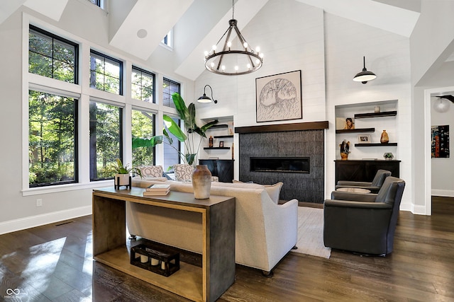 10725 Holliday Farms Blvd, Zionsville, IN 46077 - living area with high vaulted ceiling, baseboards, plenty of natural light, and dark wood finished floors