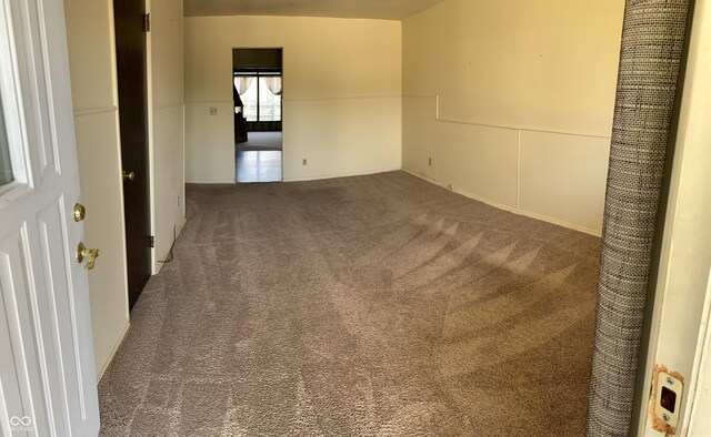 unfurnished room with carpet