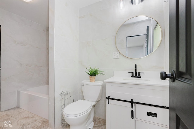 8041 Barry Rd, Indianapolis, IN 46219 - full bath featuring vanity, toilet, and tile walls
