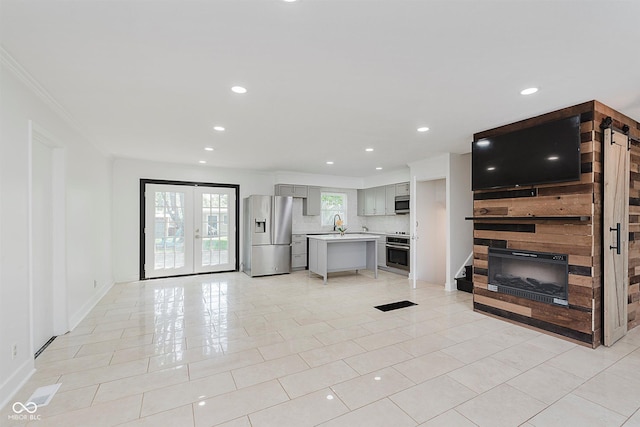 8041 Barry Rd, Indianapolis, IN 46219 - unfurnished living room featuring a fireplace, recessed lighting, crown molding, light tile patterned floors, and baseboards