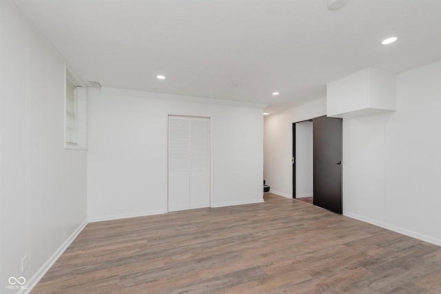 8041 Barry Rd, Indianapolis, IN 46219 - empty room with light wood-style flooring, recessed lighting, and baseboards
