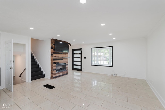 8041 Barry Rd, Indianapolis, IN 46219 - unfurnished room featuring a large fireplace, stairs, light tile patterned floors, recessed lighting, and baseboards