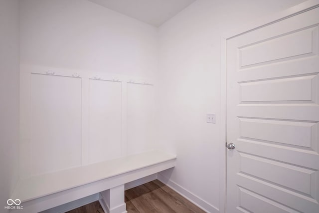 mudroom with baseboards and dark wood-style flooring