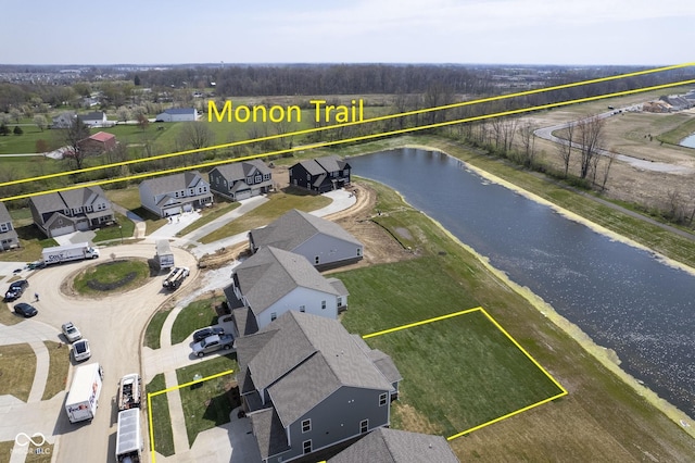 aerial view with a water view and a residential view