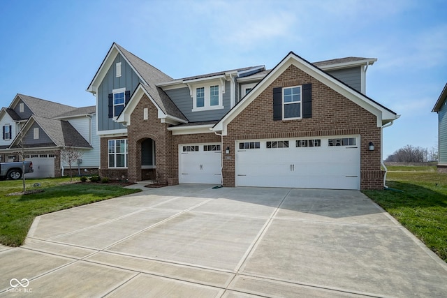 craftsman inspired home with a front lawn, concrete driveway, board and batten siding, an attached garage, and brick siding