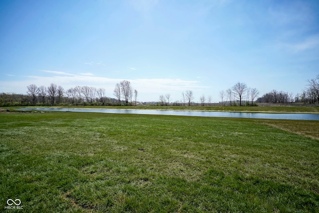 view of yard with a water view
