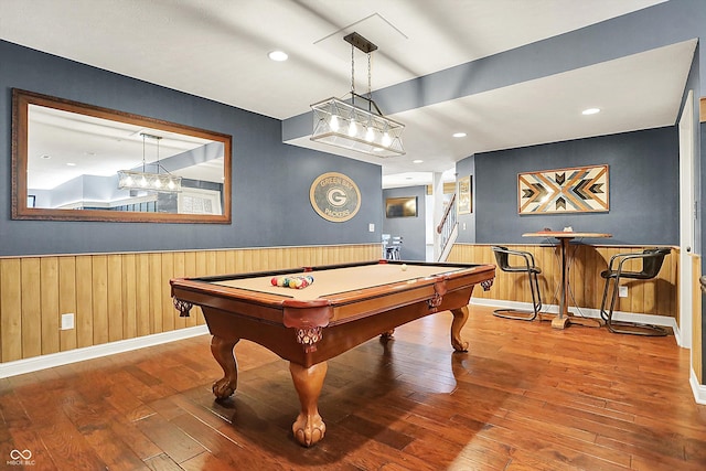 rec room featuring wood-type flooring, recessed lighting, wainscoting, and billiards