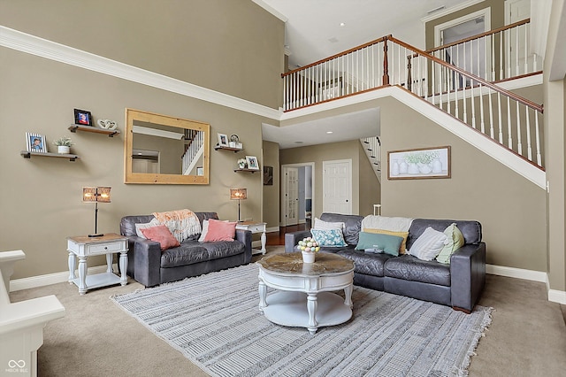 living area with carpet floors, baseboards, stairs, and a high ceiling