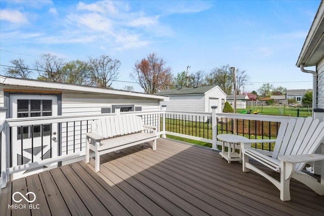 wooden deck featuring an outdoor structure
