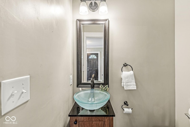 half bathroom with vanity